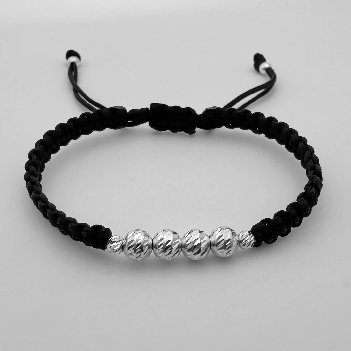 Pulsera tejida de bebé con balin