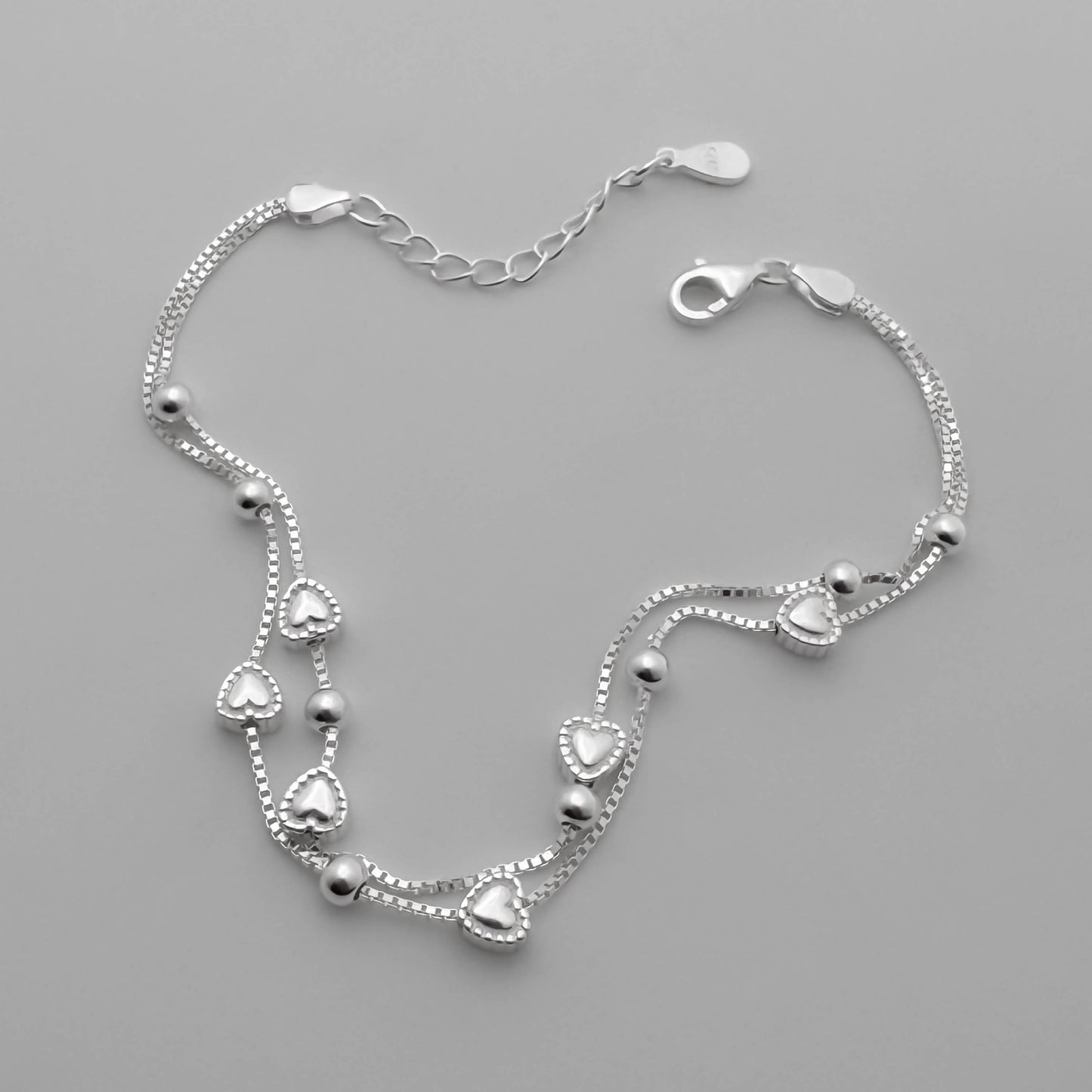 Pulsera soble Corazones