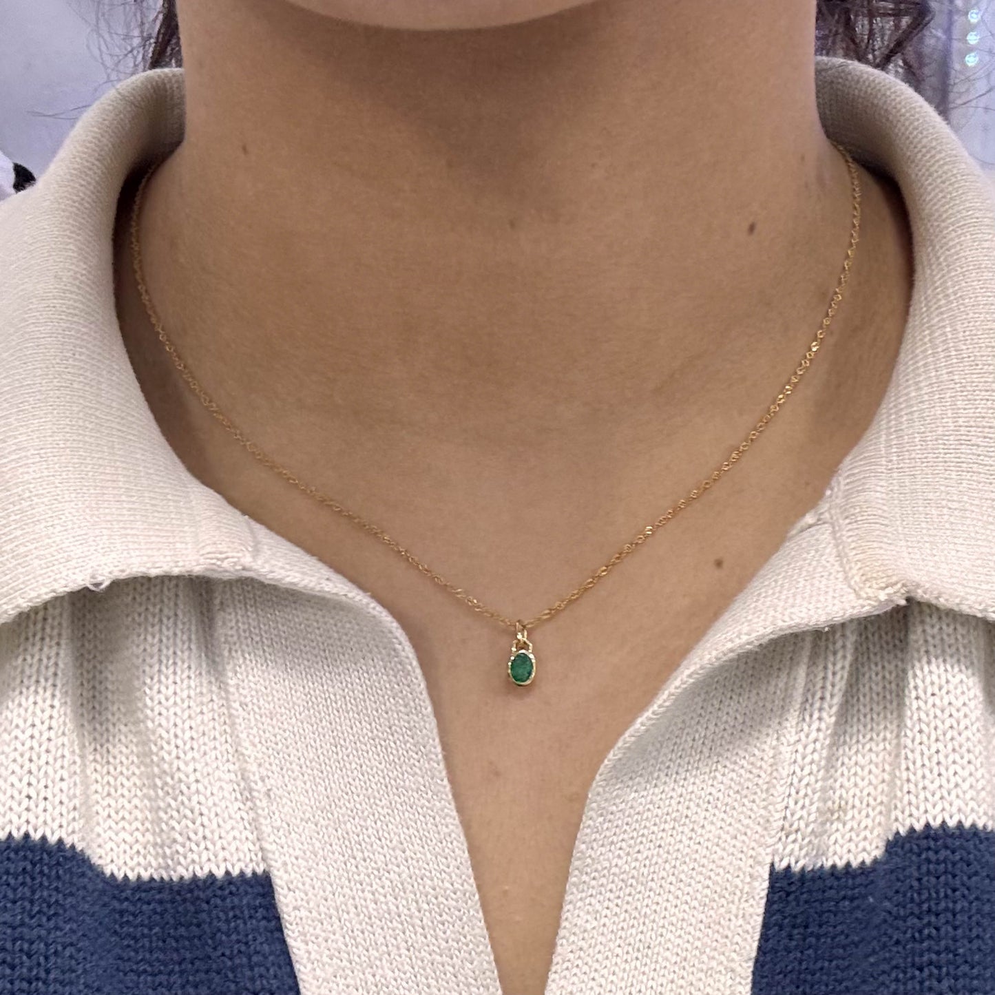 Dije Oro 18k y Esmeralda Ovalada