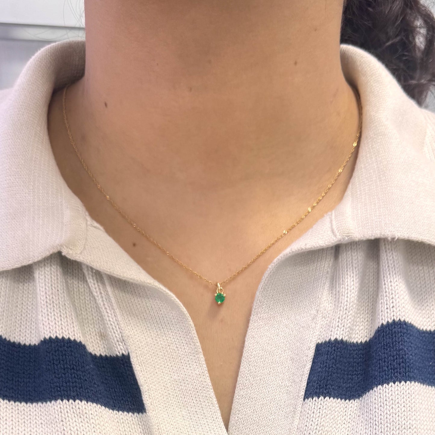 Dije Oro 18k y Esmeralda redonda