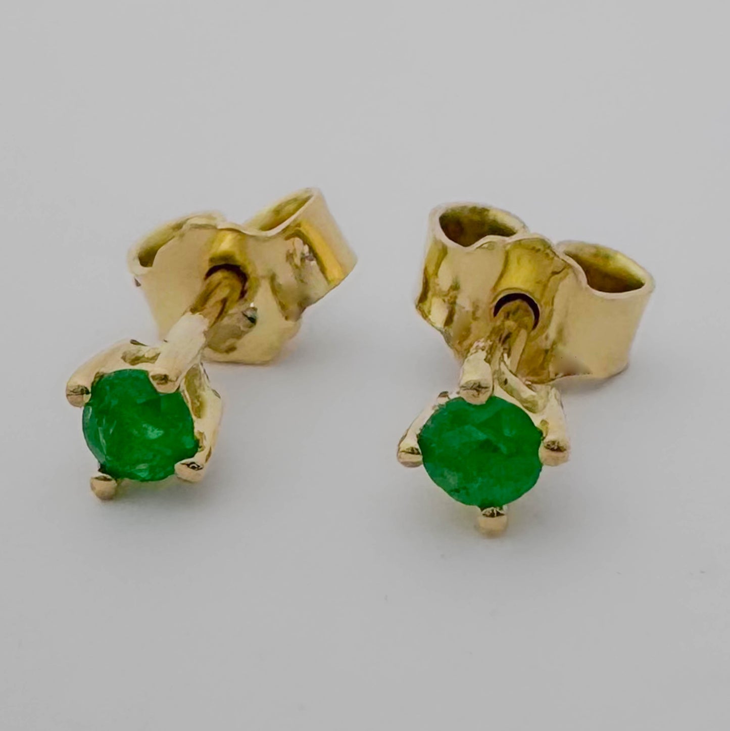 Topos Oro 18k y esmeralda