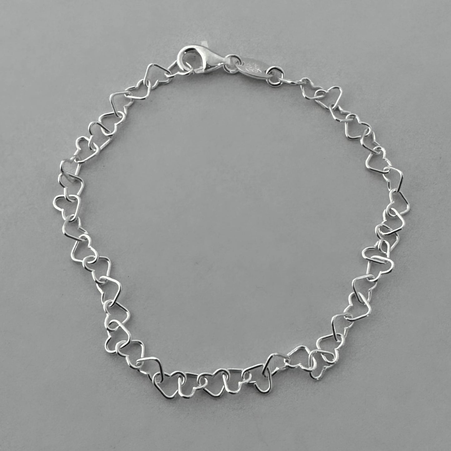 Pulsera corazones mediana