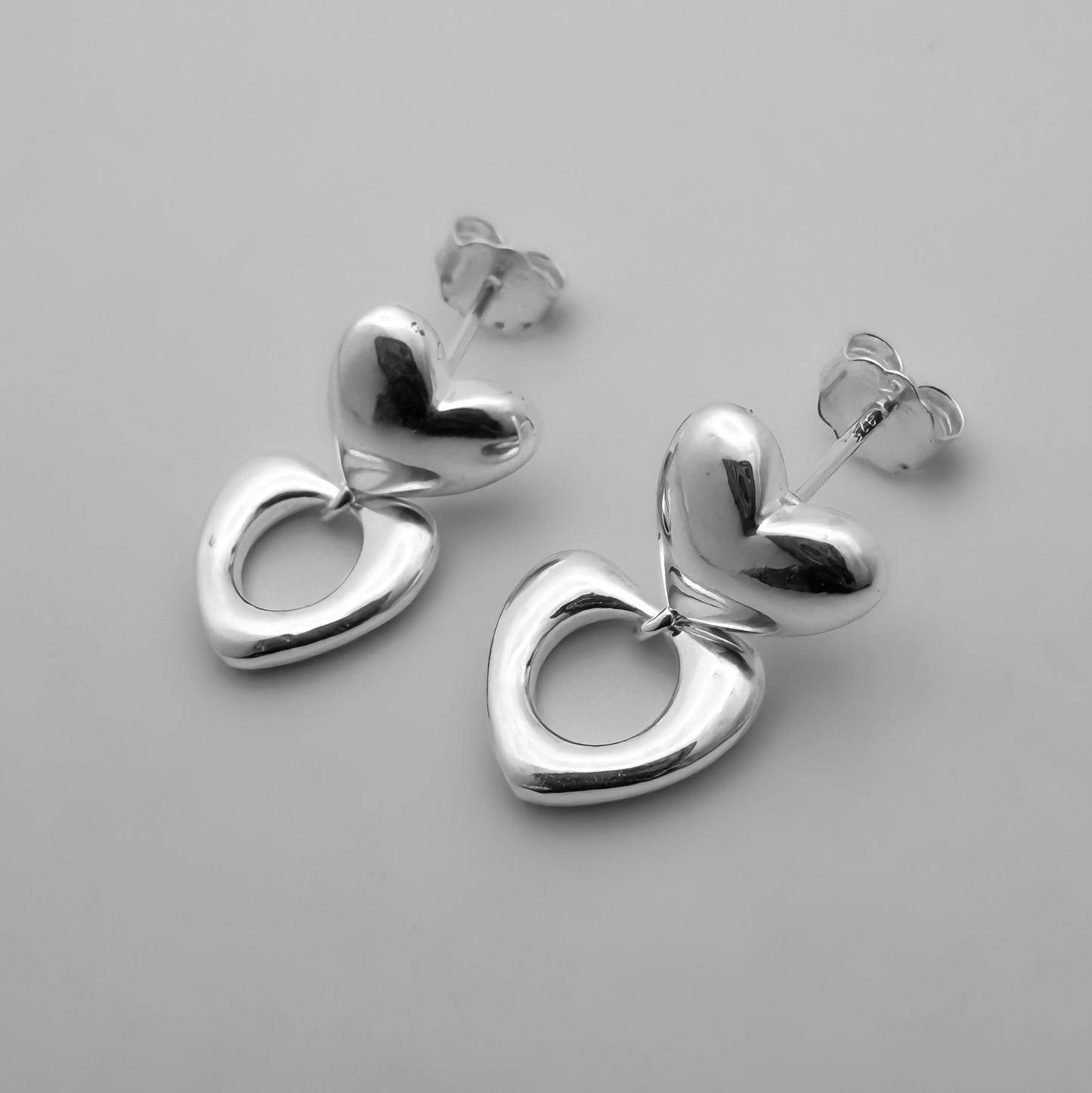 Aretes Doble Corazón Pulido