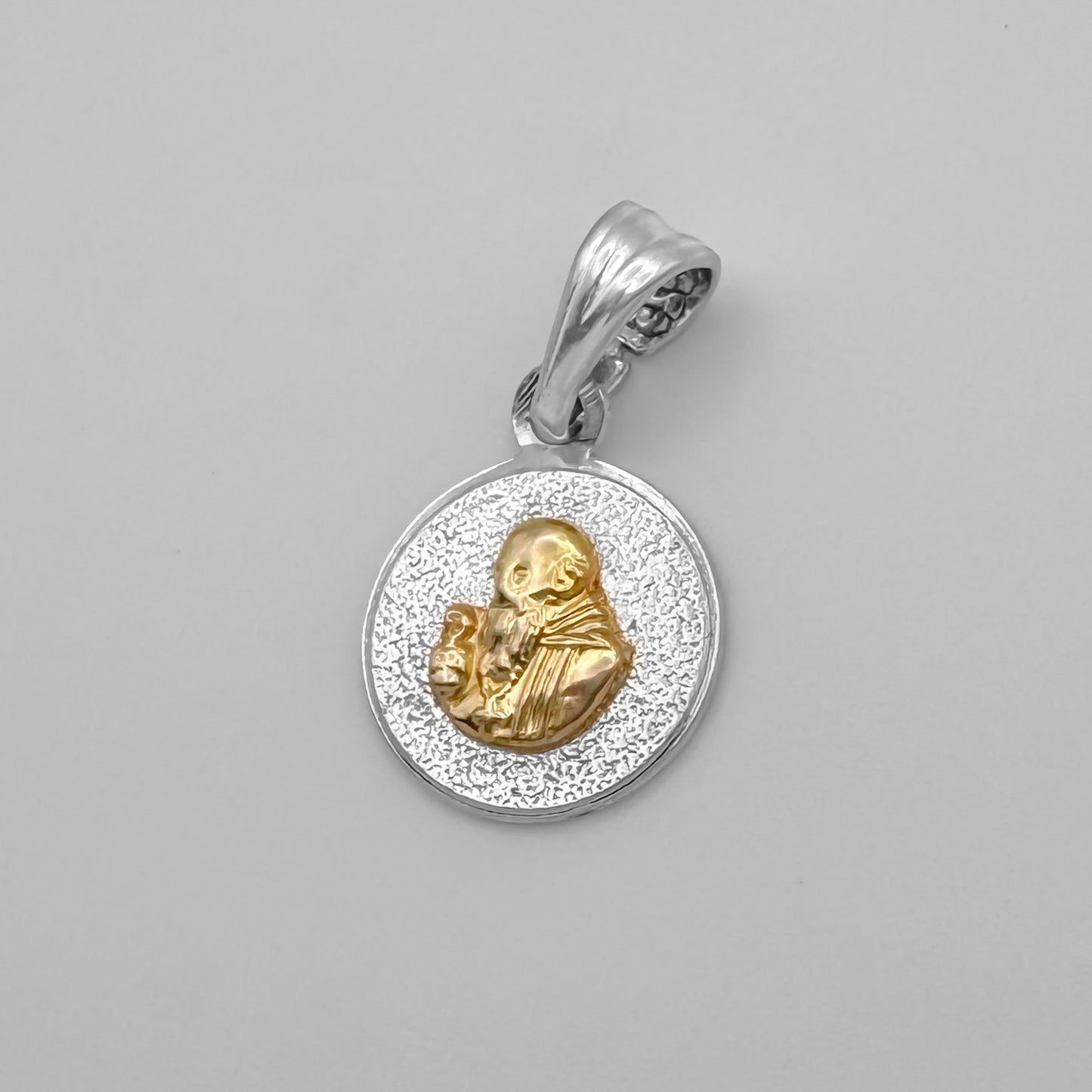 Dije rostro San Benito