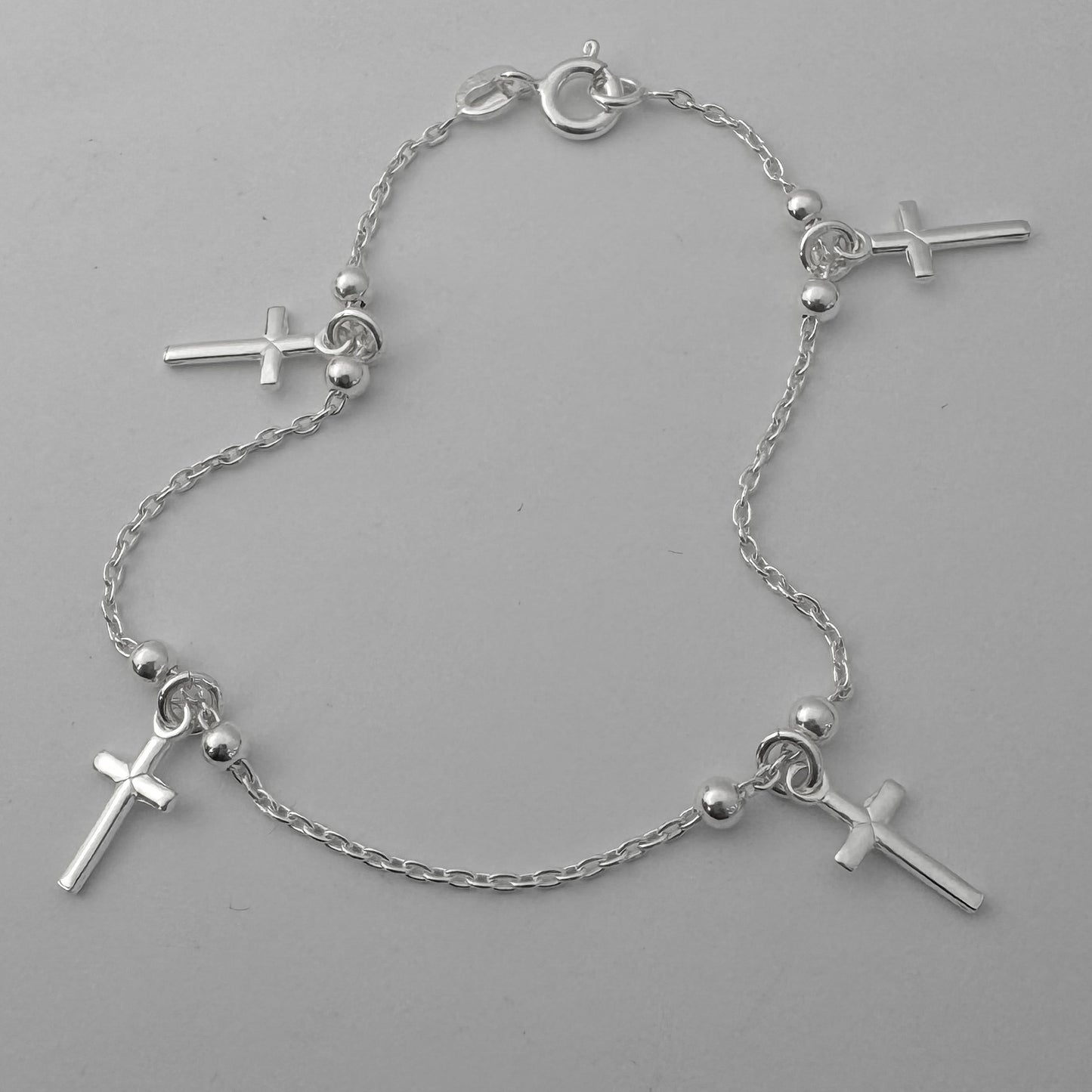 Pulsera con cruces