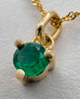 Dije Oro 18k y Esmeralda redonda
