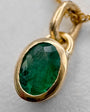 Dije Oro 18k y Esmeralda Ovalada