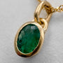 Dije Oro 18k y Esmeralda Ovalada