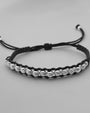 Pulsera Tejida Órbitas Negra