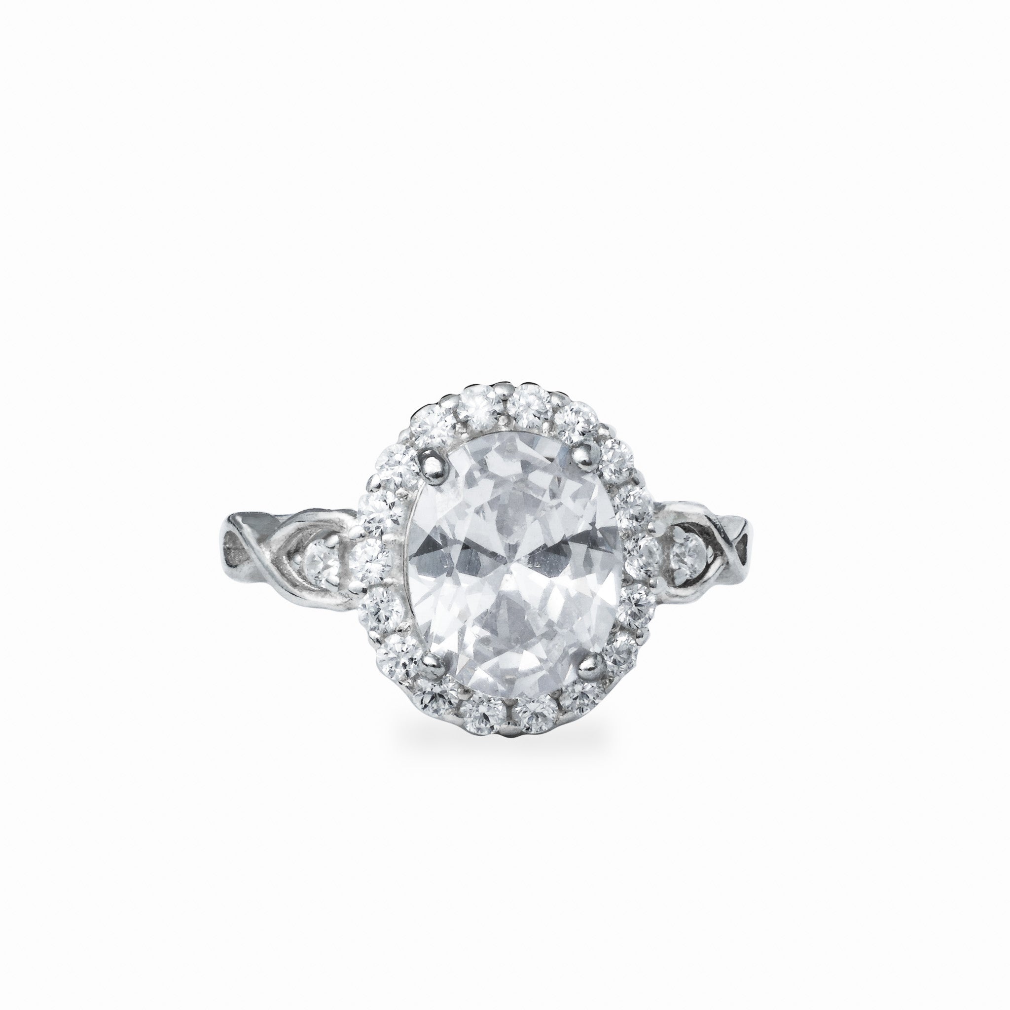 Anillo de cóctel en Plata Ley 925 talla 7 con un gran cirón ovalado central y halo de circones brillantes sobre montura de 13x11mm.