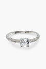 Anillo solitario de compromiso en Plata Ley 925 talla 8 con cirón central de 6mm y piedras brillantes en los laterales.