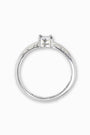 Anillo solitario de compromiso en Plata Ley 925 talla 8 con cirón central de 6mm y piedras brillantes en los laterales.