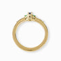 Anillo en oro con tanzanita, esmeralda y diamantes.