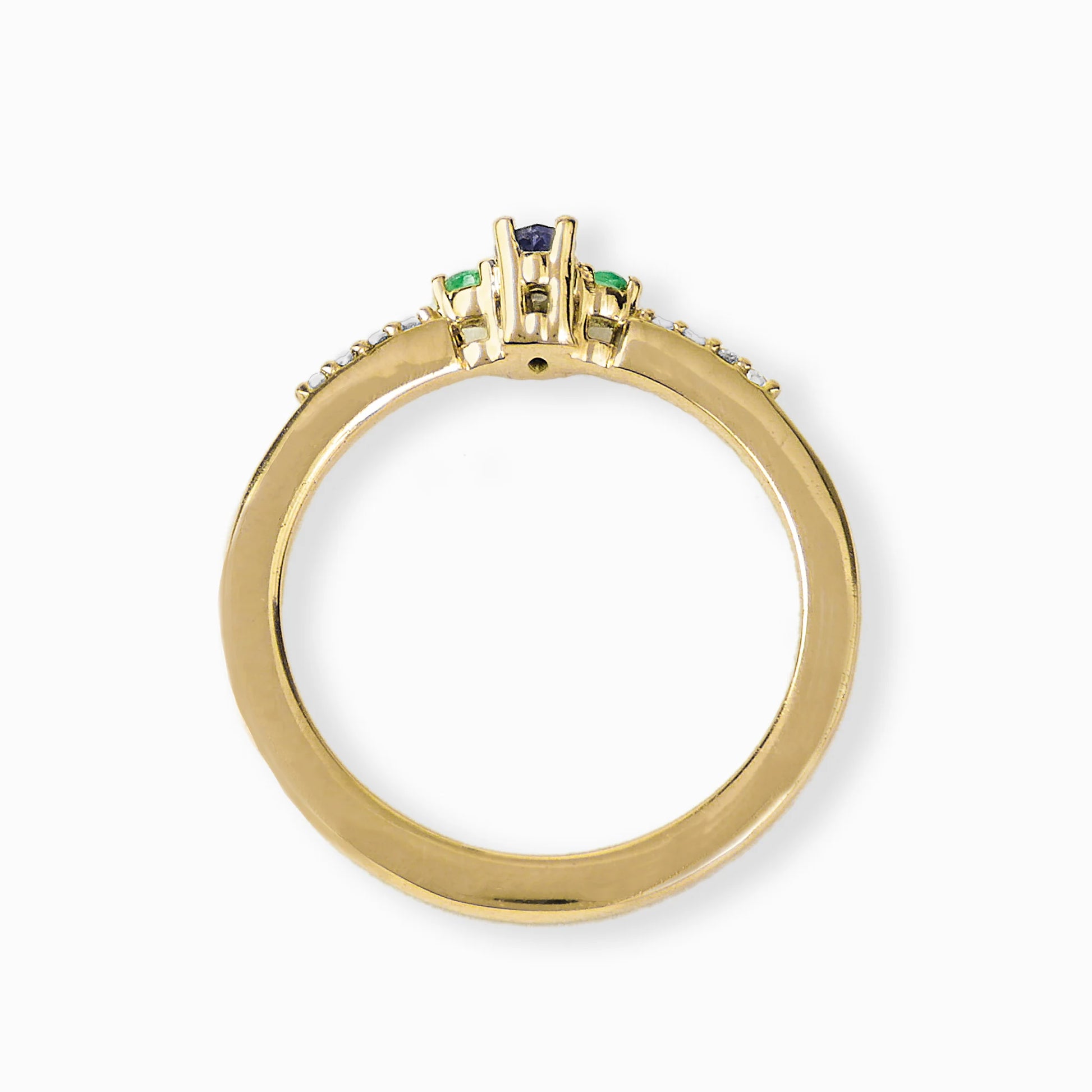Anillo en oro con tanzanita, esmeralda y diamantes.