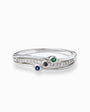 Anillo sinuoso de Plata Ley 925 talla 8 que incorpora tres circones redondos de colores azul, rojo y verde rodeados de microcircones blancos