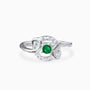 Anillo de Plata Ley 925 talla 5 con un cirón redondo verde en el centro rodeado de ondas caladas con circones blancos.