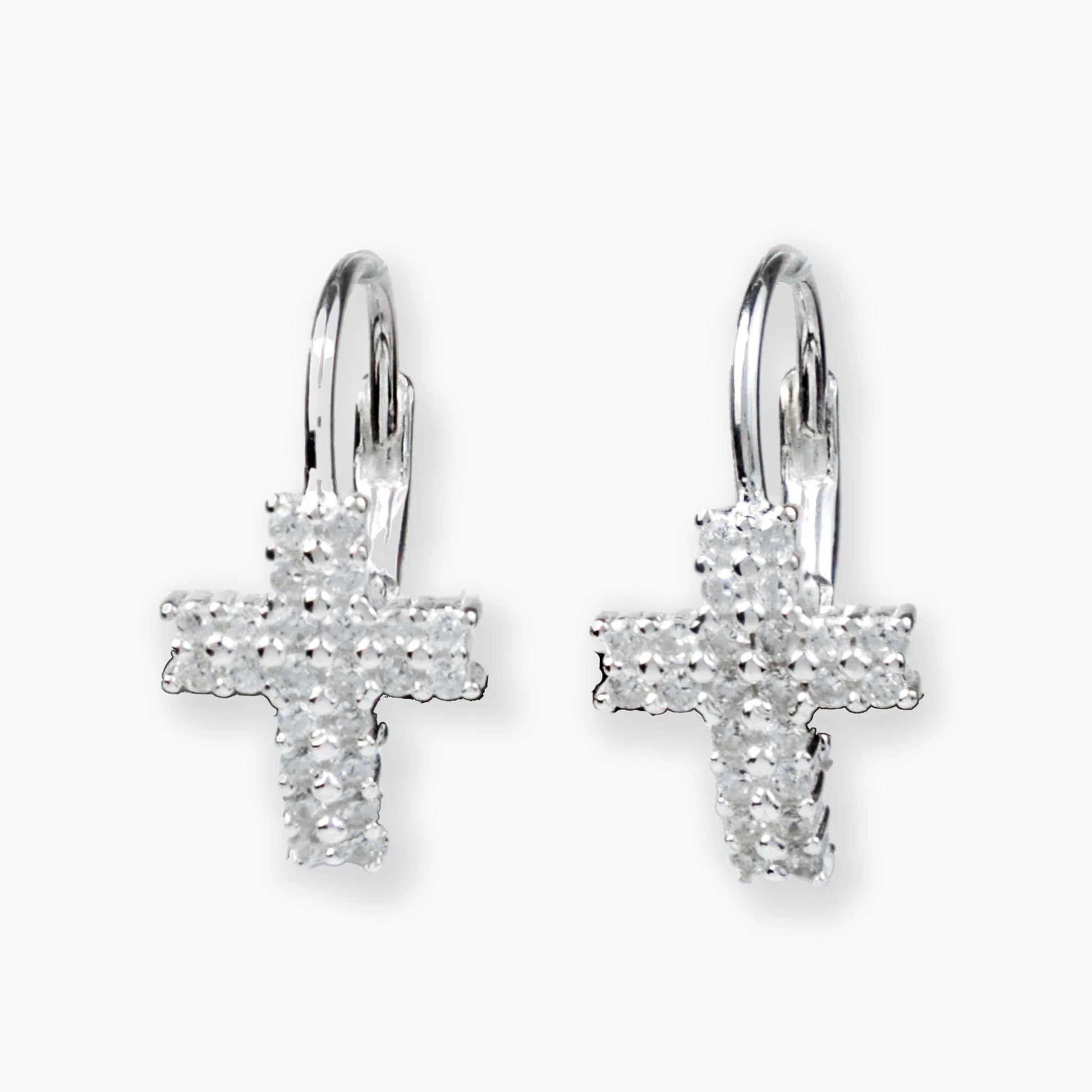 Aretes colgantes con diseño de cruz y circones en plata ley 925.