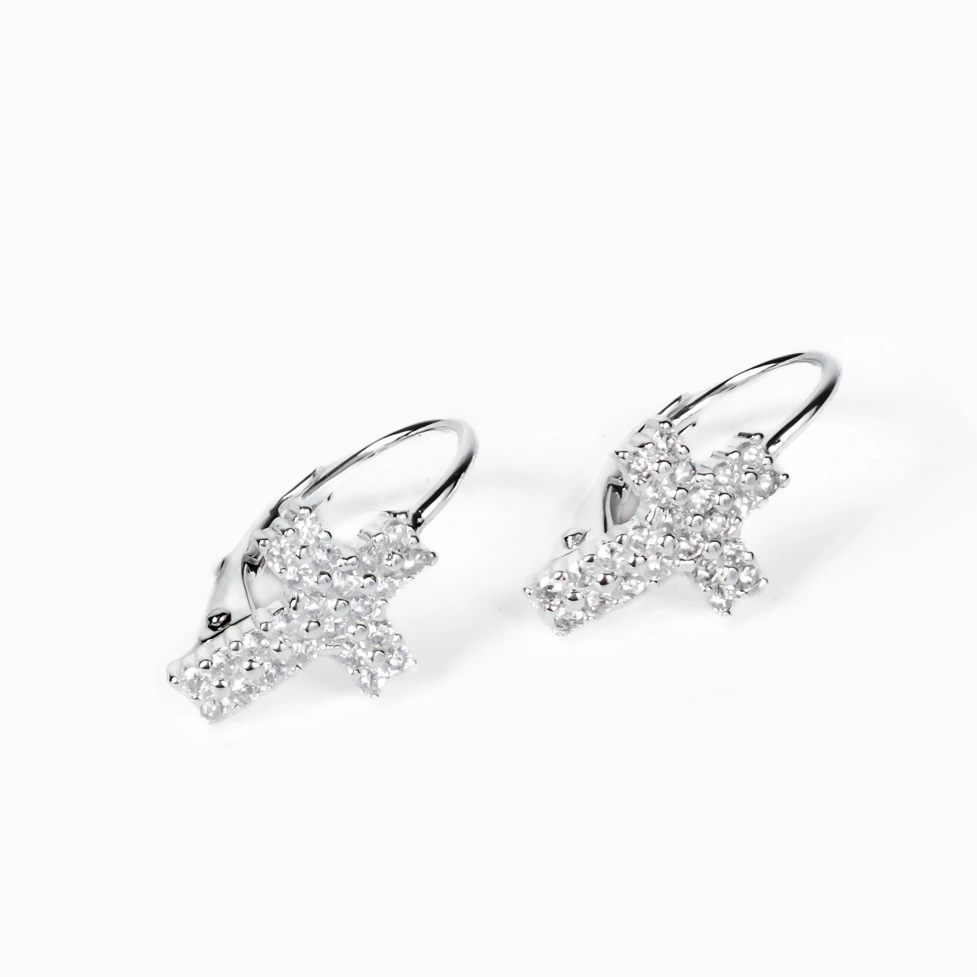 Aretes colgantes con diseño de cruz y circones en plata ley 925.