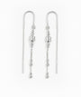 Aretes tipo hilo con esferas en plata ley 925.