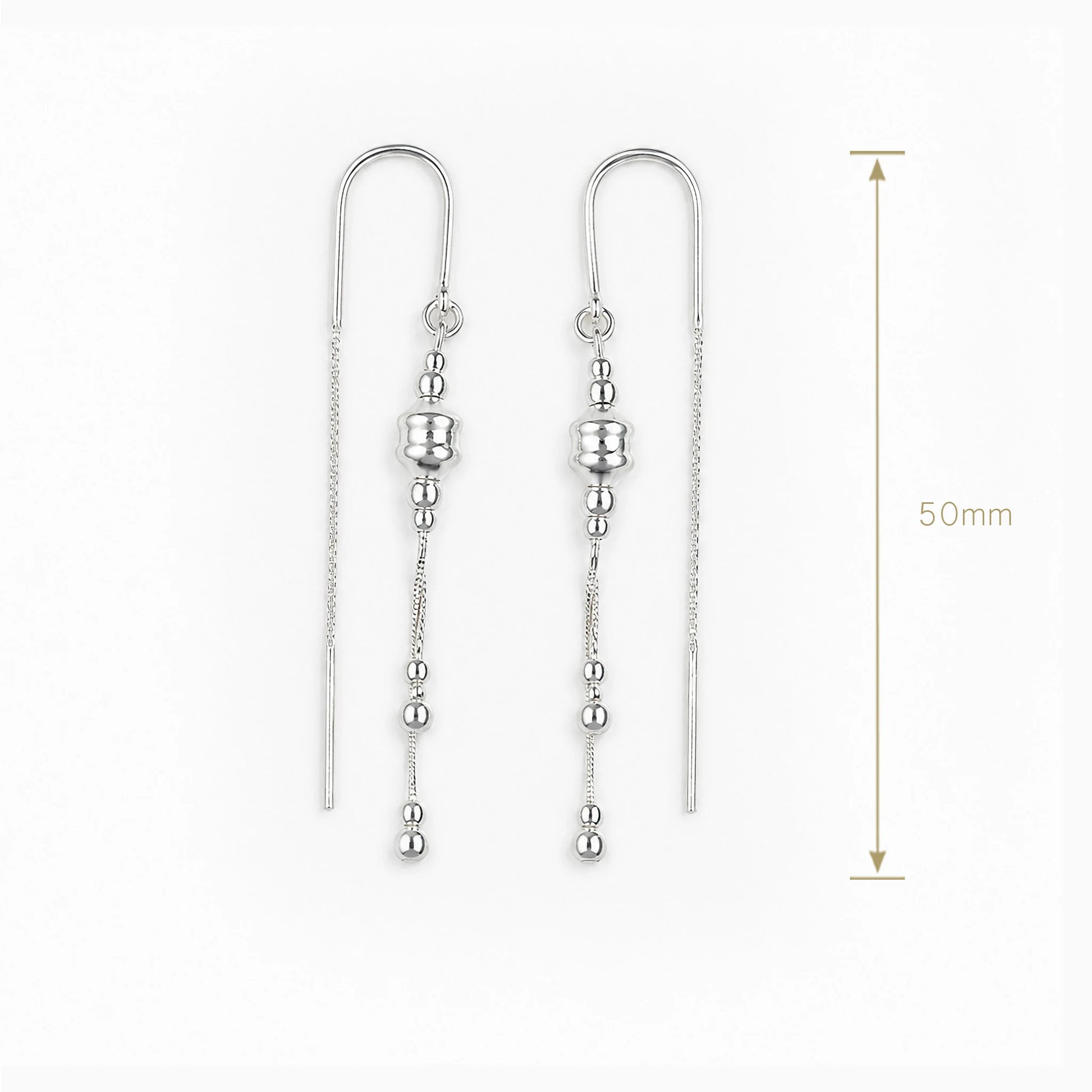 Aretes tipo hilo con esferas en plata ley 925.