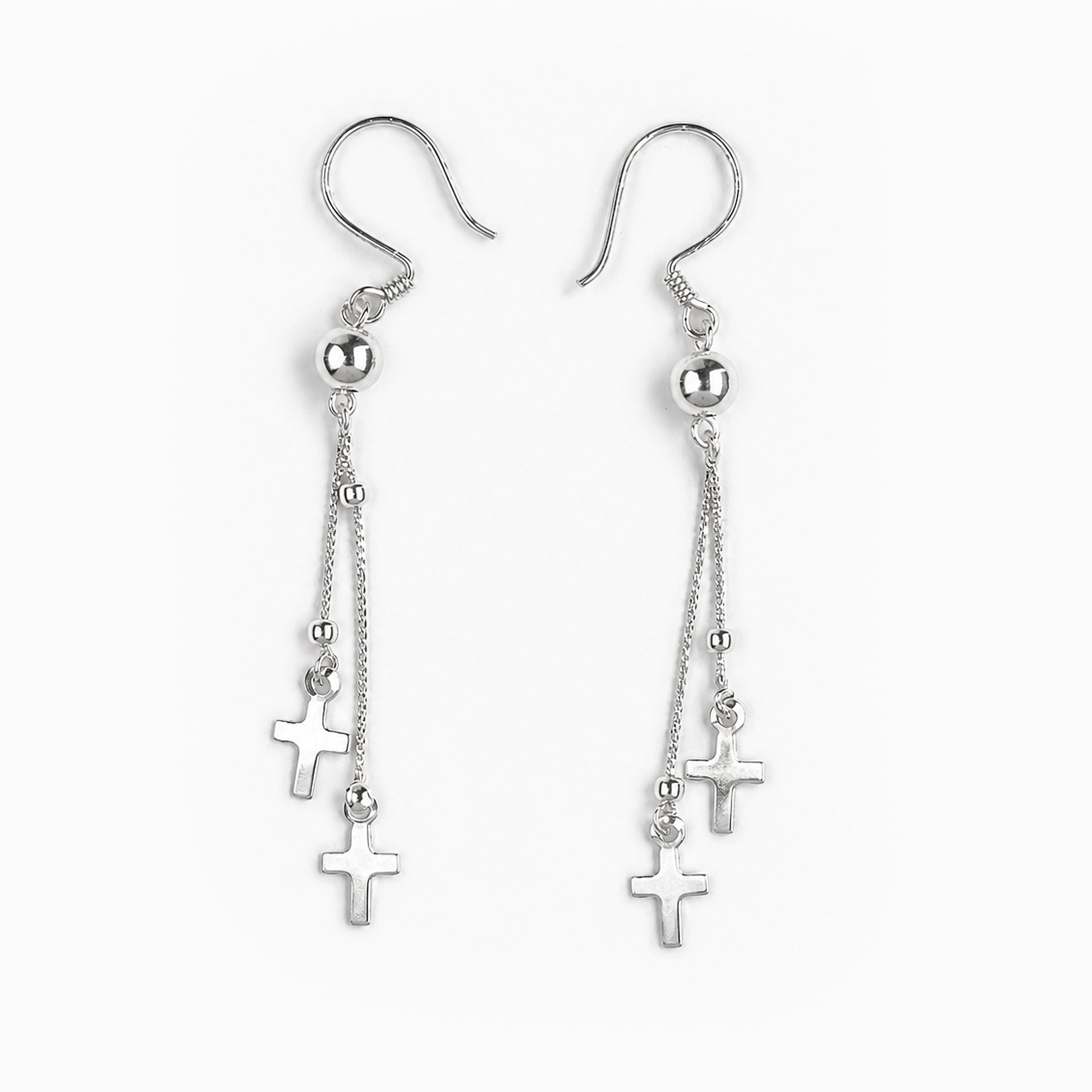 Aretes colgantes con diseño de cruz en plata ley 925.