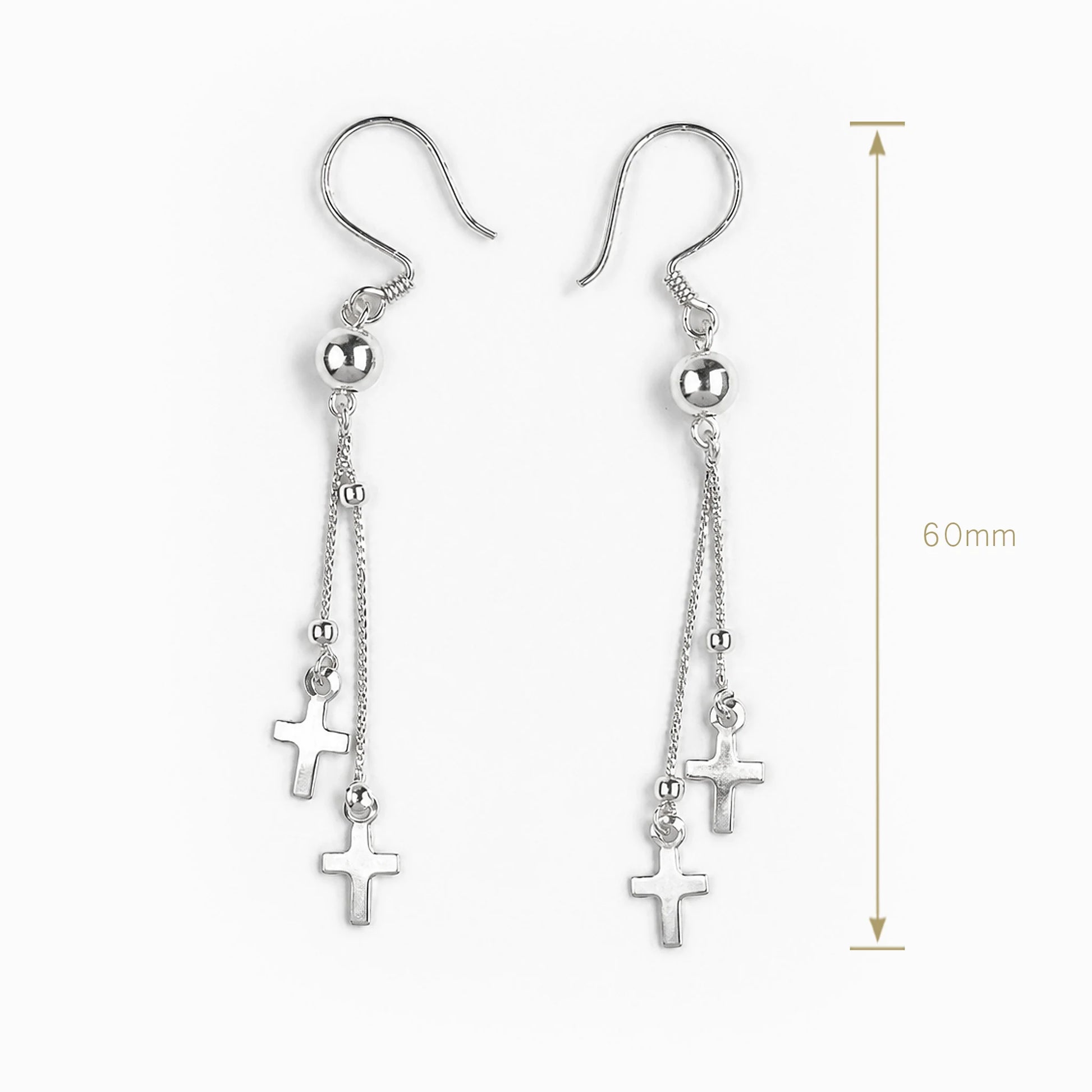 Aretes colgantes con diseño de cruz en plata ley 925.