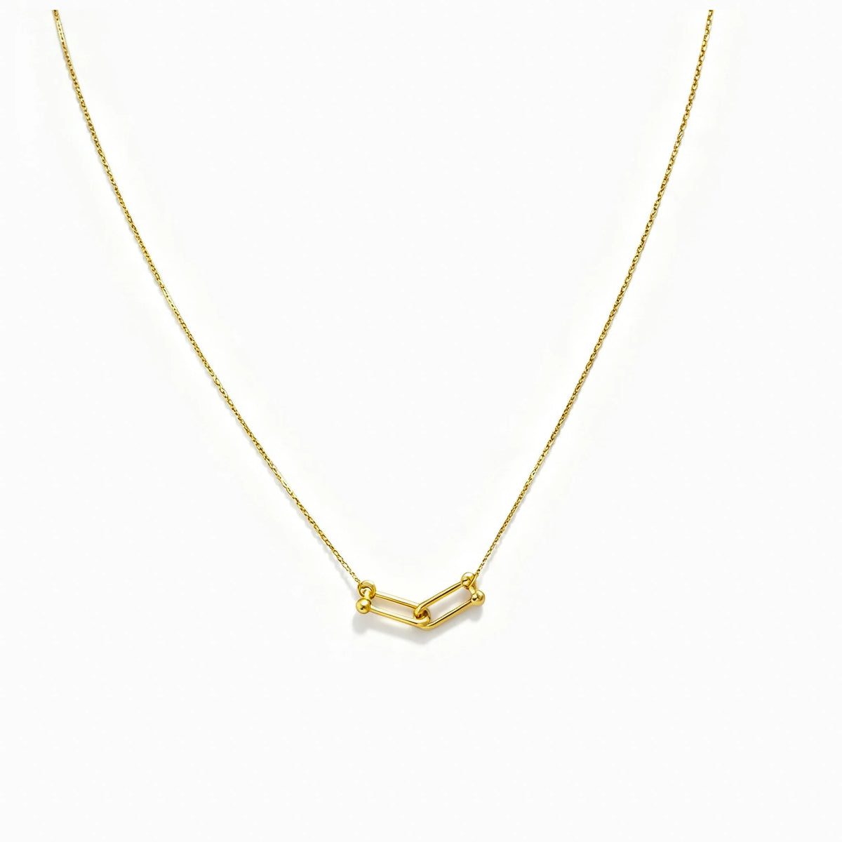 Cadena en oro 18K de tejido veneciano con dije nexo interconectado de 10x4 mm.