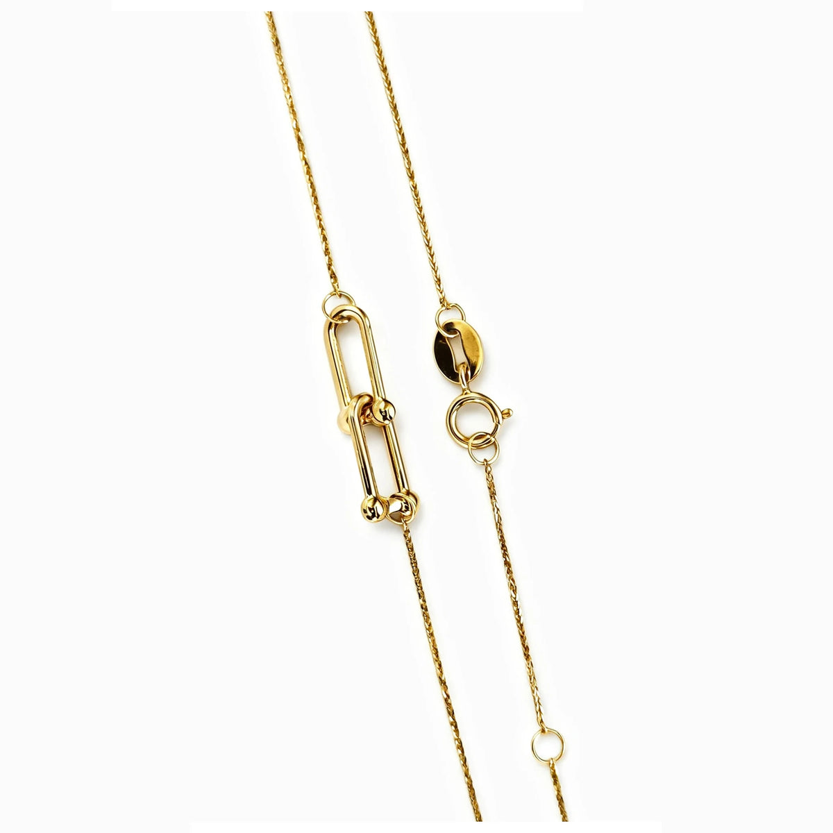 Cadena en oro 18K de tejido veneciano con dije nexo interconectado de 10x4 mm.