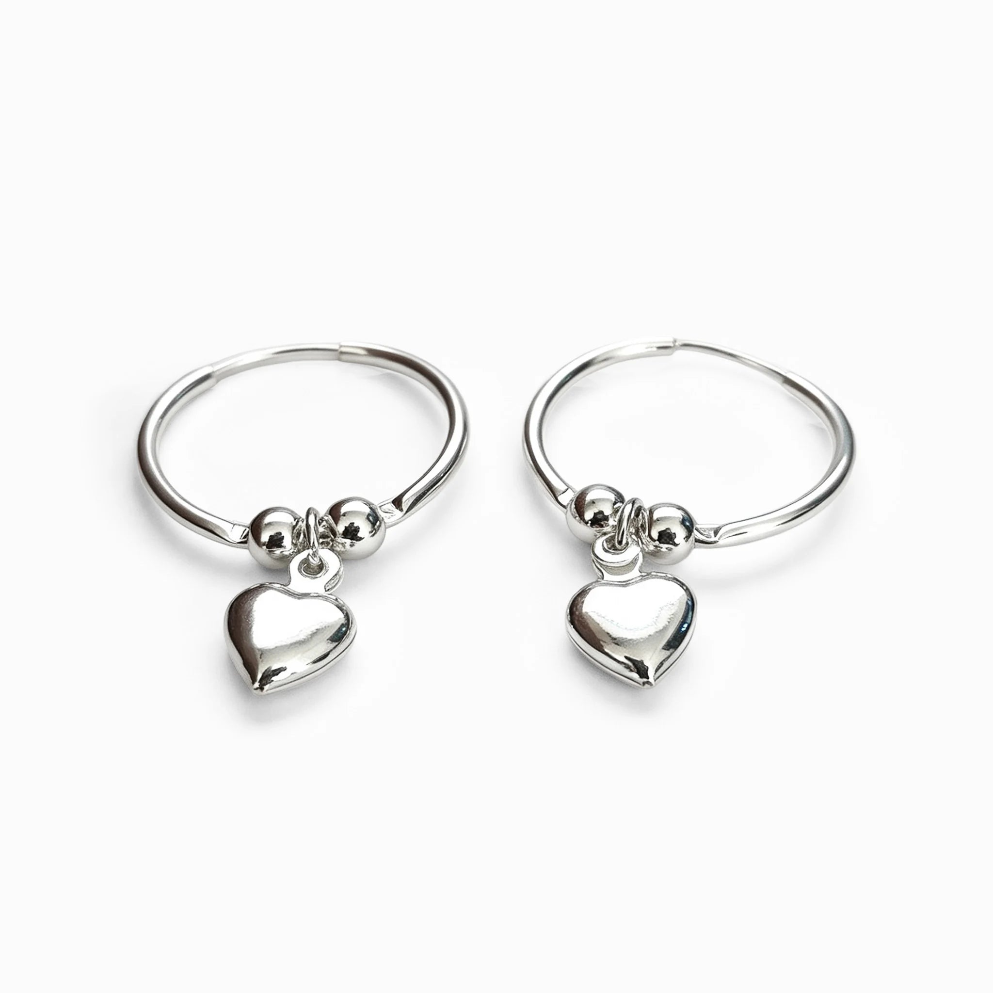 Candongas con balines y dije de corazón en plata ley 925 de 21 mm