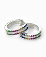 Aretes tipo huggies en plata ley 925 de 14x3.7 mm con circones de cuatro colores.