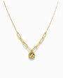 Cadena en oro 18K con tejido veneciano, sección paperclip y dije circular diamantado de 9 mm.