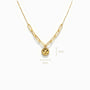 Cadena en oro 18K con tejido veneciano, sección paperclip y dije circular diamantado de 9 mm.