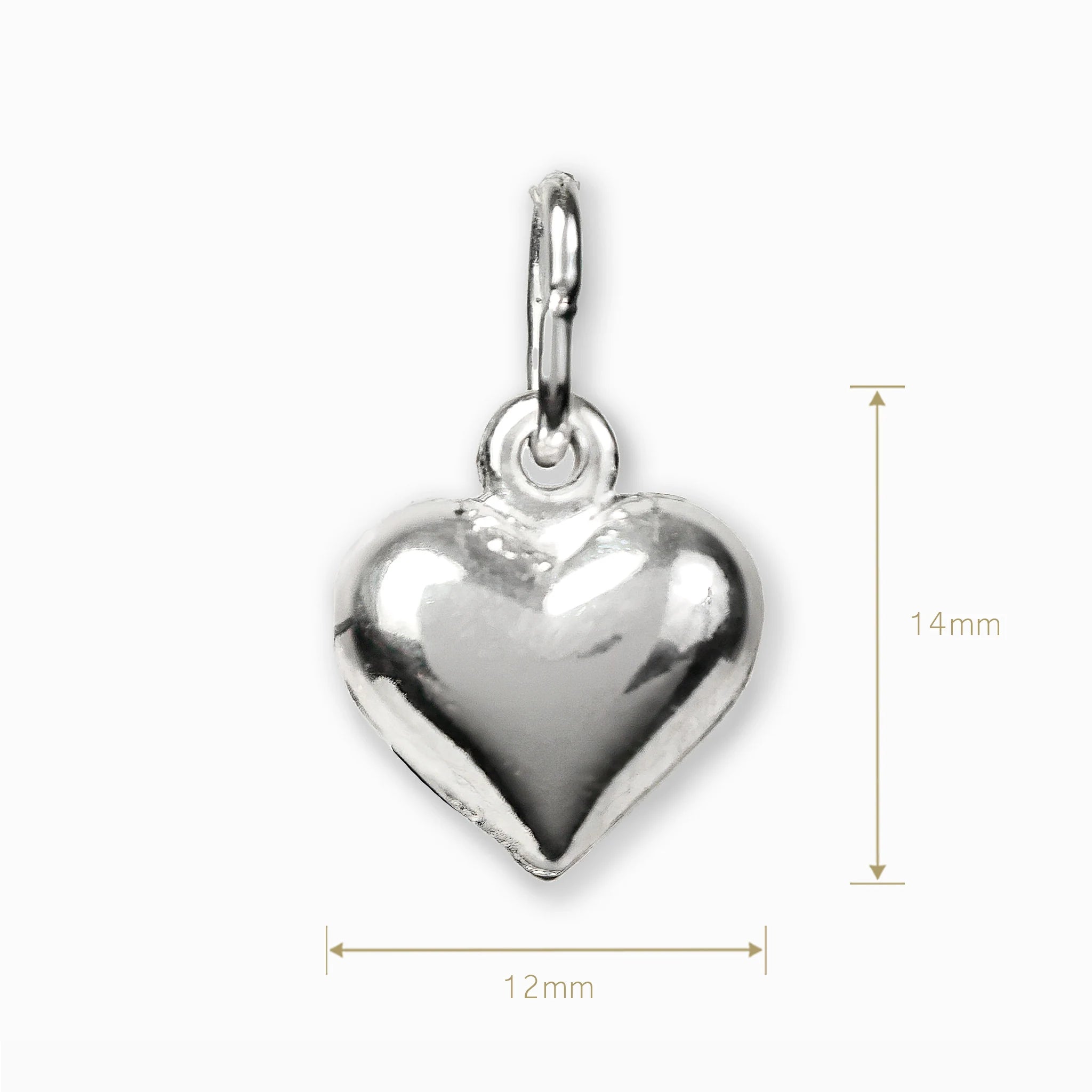 Dije de corazón brillante en plata ley 925.