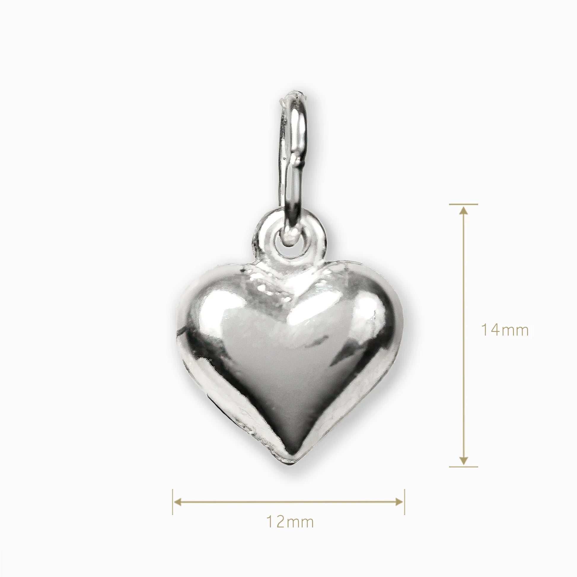 Dije de corazón brillante en plata ley 925.