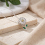 Dije con diseño de margarita giratoria en plata ley 925 para mujer