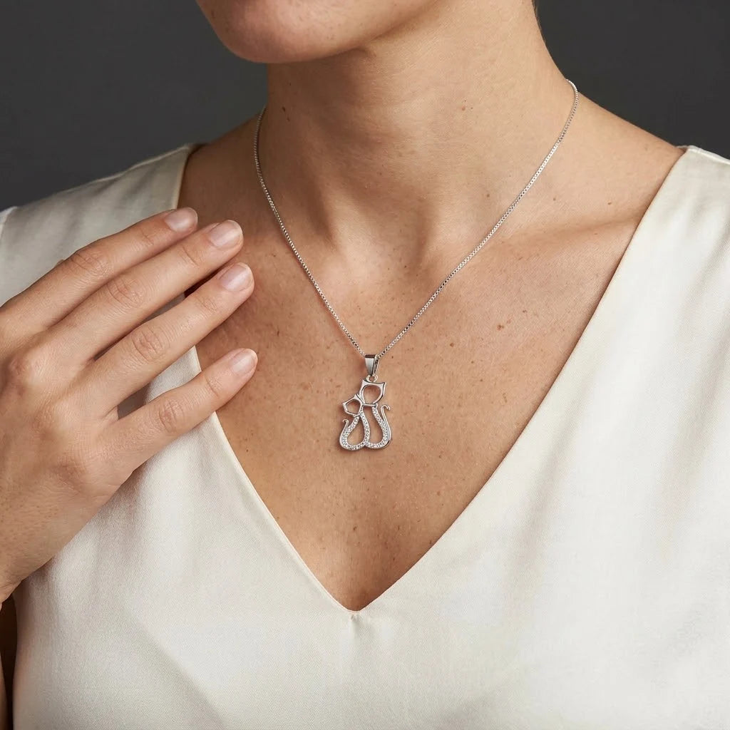 Dije de silueta de pareja de gatos de 20x14 mm en plata ley 925 con circones