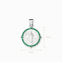 Dije de la medalla de San Benito elaborado en plata ley 925 rodeado de brillantes circones verdes de 15 mm de diámetro sobre fondo blanco.
