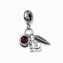 Dije con temática de escritor y circon rojo en plata ley 925.
