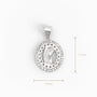 Dije de medalla de la Virgen calada en Plata Ley 925 con halo de circones de Joyería Esterlina.