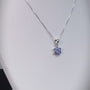Collar floral clásico en plata ley 925 con tanzanitas para mujer