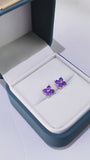 Topos con diseño floral de 6.7x6.7 mm en plata ley 925 con amatista natural