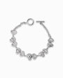 Pulsera eslabonada de 19cm en Plata Ley 925 rodinada con eslabones de corazones con circones y broche de timón T-toggle.