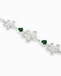 Pulsera con flores de 5 pétalos en plata ley 925 y circones verde esmeralda.   