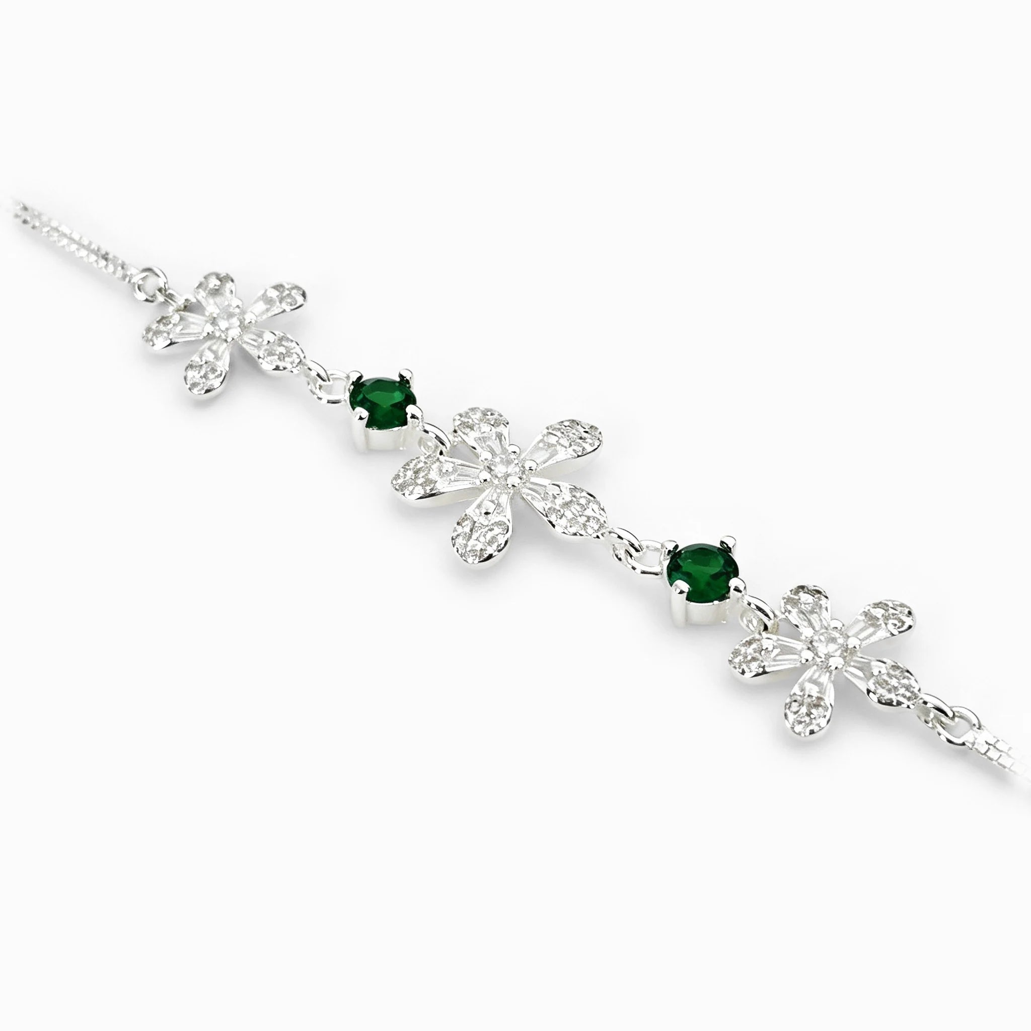 Pulsera con flores de 5 pétalos en plata ley 925 y circones verde esmeralda.   