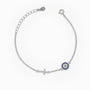 Pulsera de plata ley 925 con ojo turco y cruz decorados con circones.