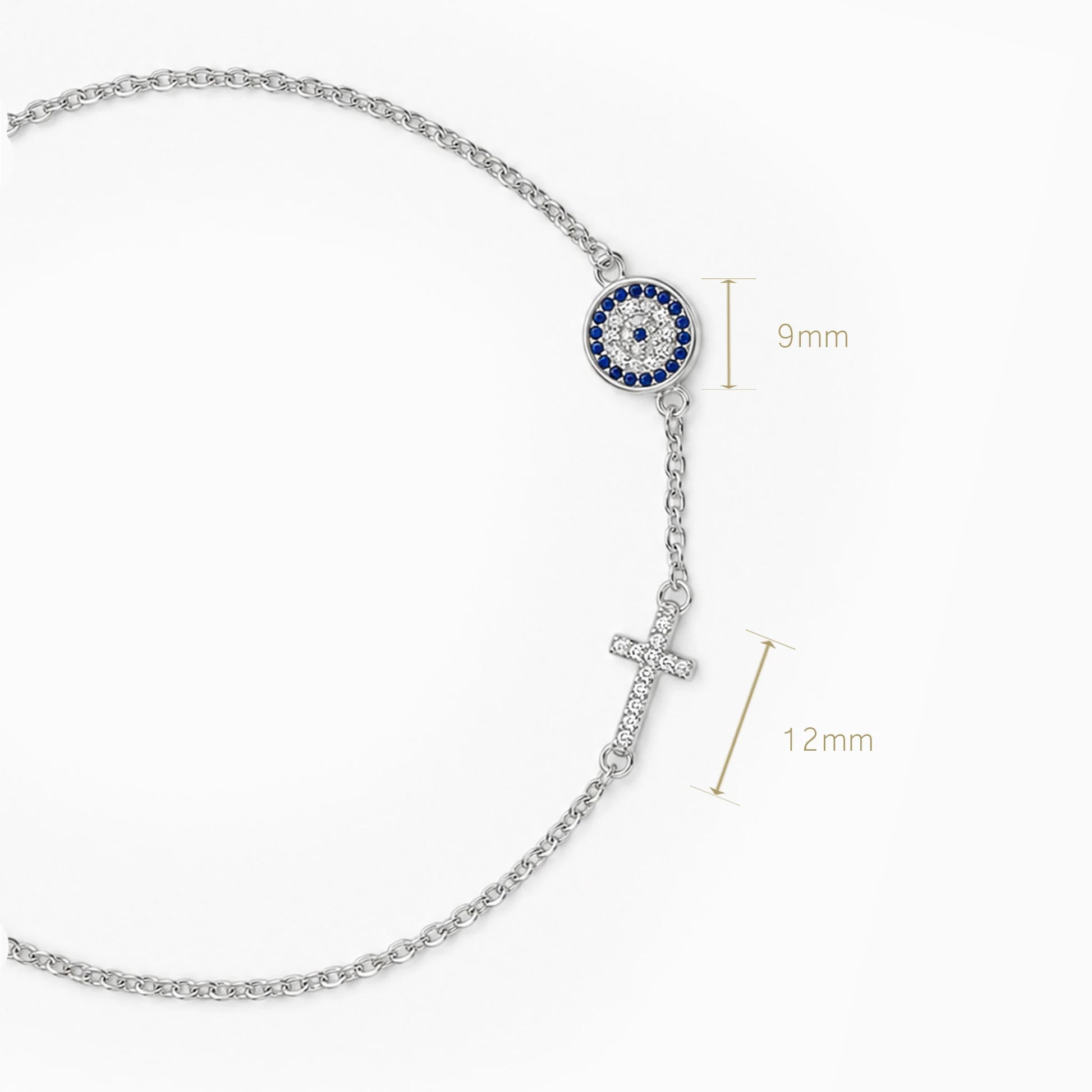 Pulsera de plata ley 925 con ojo turco y cruz decorados con circones.