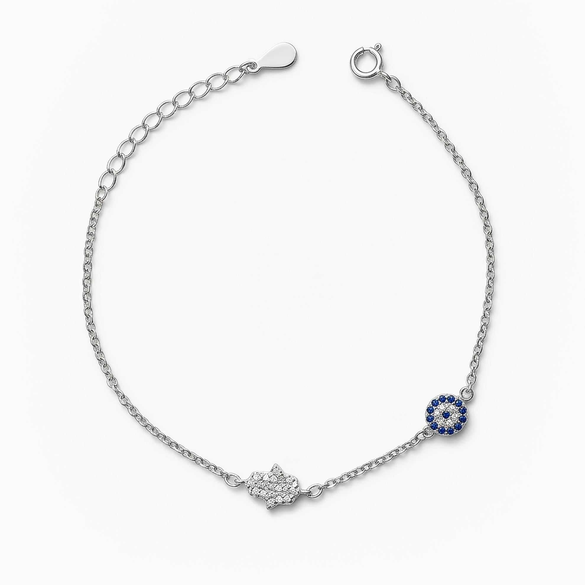 Pulsera en plata ley 925 con símbolos de ojo turco y mano de fátima decorada con circones.