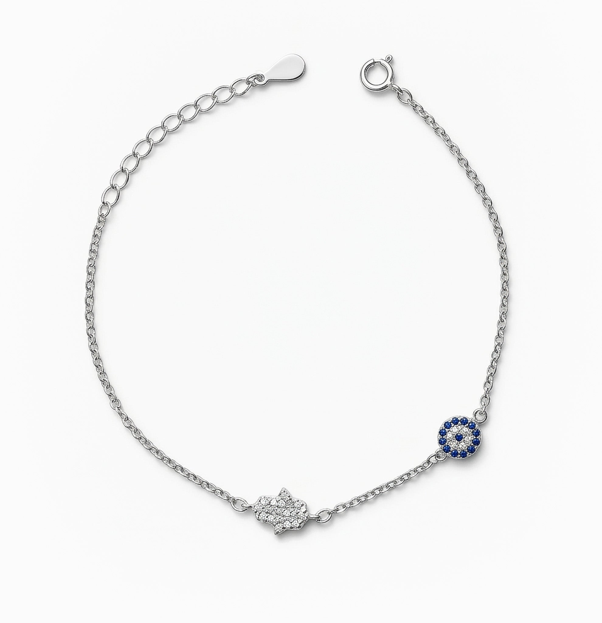 Pulsera en plata ley 925 con símbolos de ojo turco y mano de fátima decorada con circones.
