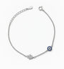 Pulsera en plata ley 925 con símbolos de ojo turco y mano de fátima decorada con circones.