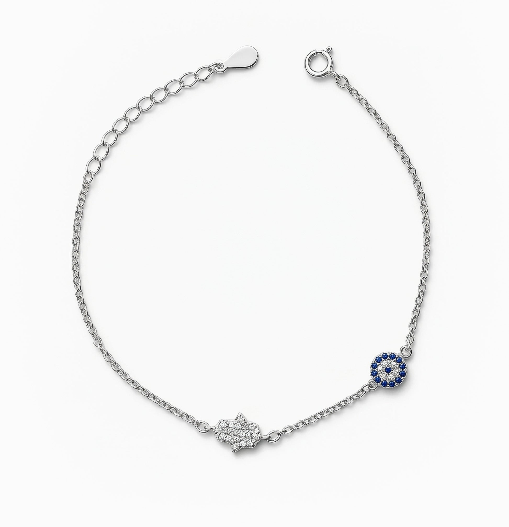 Pulsera en plata ley 925 con símbolos de ojo turco y mano de fátima decorada con circones.
